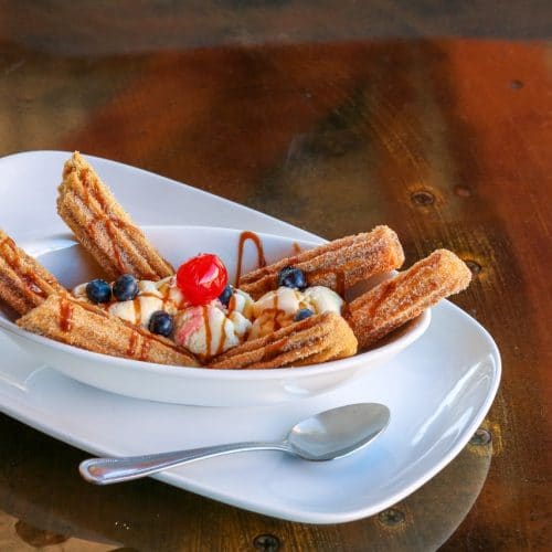 Churros with cream and chocolate